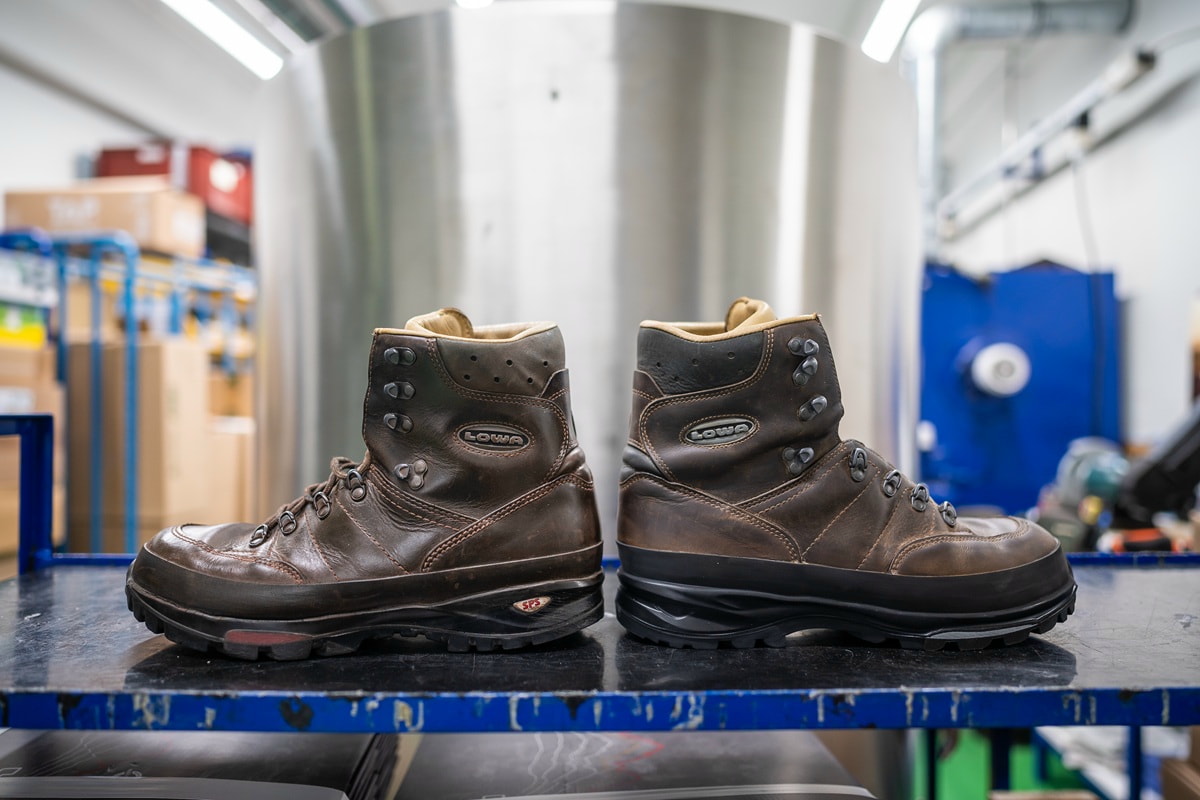 The photograph shows a photo of two old LOWA boots